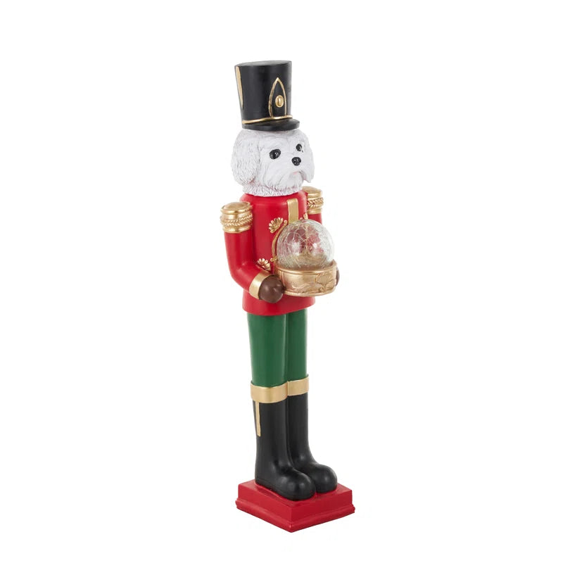 Cole and Grey Fiberglass Tall Soldier Nutcracker Dog Decorative Christmas Sculpture with LED Light Snow Globe and Green and Gold Accents